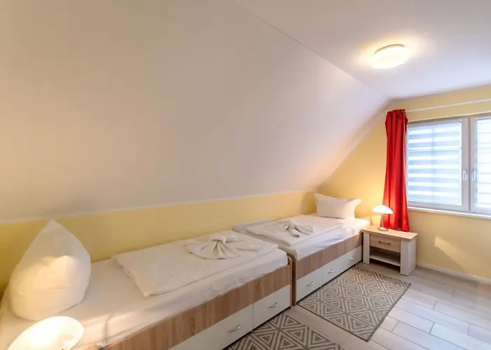 Апартаменты Doppelhaeuser Zinglingsberg - Regenbogen Остзебад Бинц